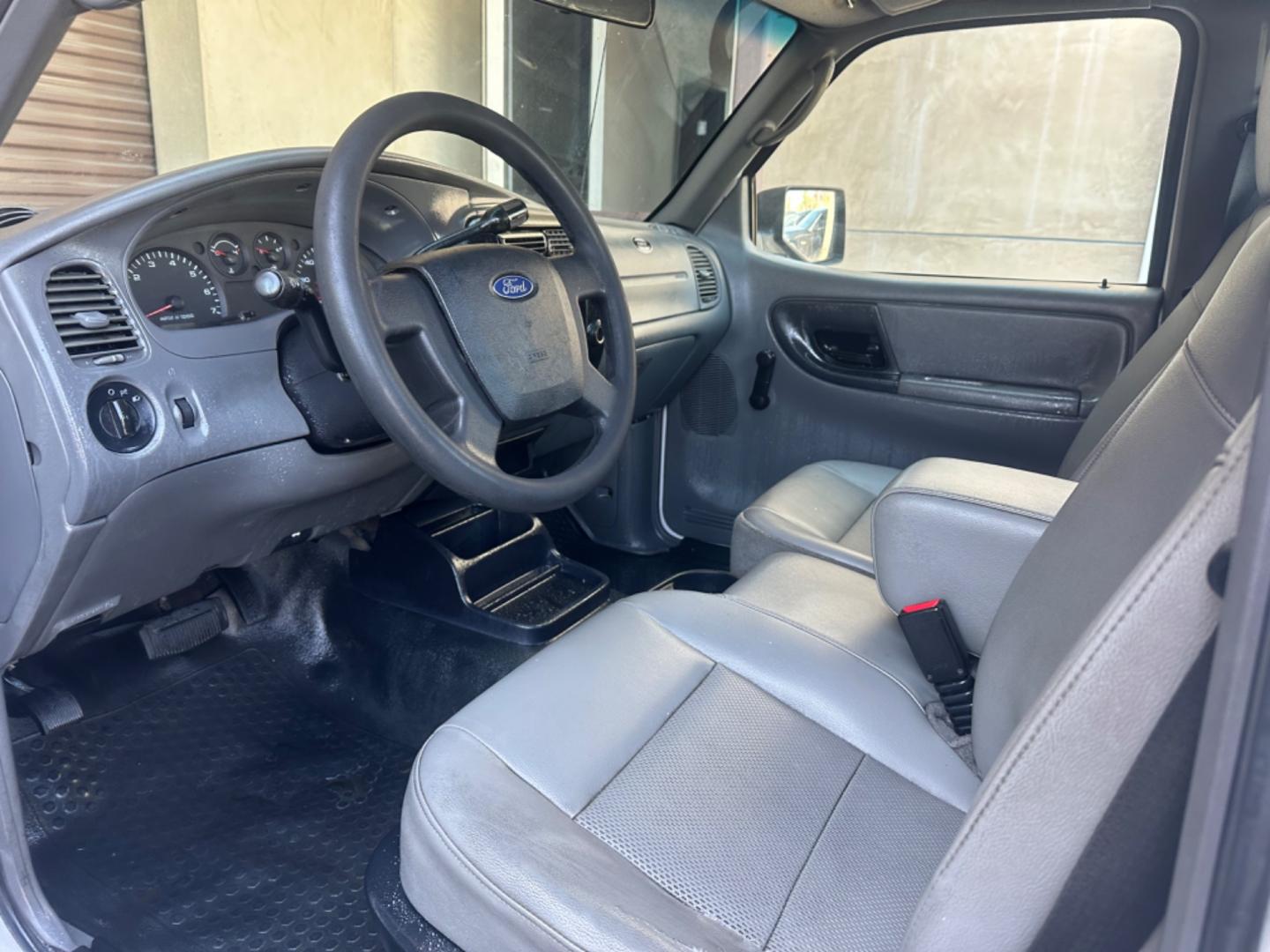 2011 WHITE /GRAY Ford Ranger XL 2WD (1FTKR1AE9BP) with an 4.0L V6 SOHC 12V engine, AUTOMATIC transmission, located at 30 S. Berkeley Avenue, Pasadena, CA, 91107, (626) 248-7567, 34.145447, -118.109398 - Body Style 2-Door REGULAR CAB PICKUP 2-DR Trim XL 2WD Engine 4.0L V6 SOHC 12V Other Transmission AUTOMATIC Drivetrain RWD Ext. Color WHITE Int. Color GRAY Stock Number 7662 VIN 1FTKR1AE9BPA78334 Location Crown City Motors Pasadena, CA WORK TRUCK!!! Crown City Motors is a use - Photo#9